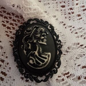Skeleton Ladies Head Handmade Brooch. Made From Resin/ Black Metal Frame